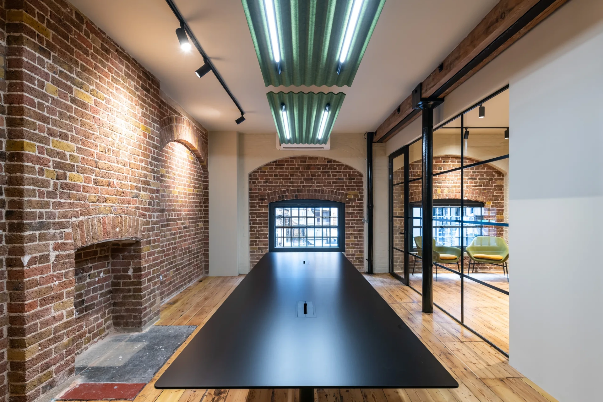 Endell Street boardroom behind black-framed glazing