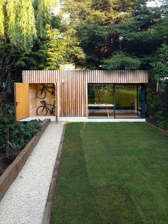Cedar-clad garden studio with bike store