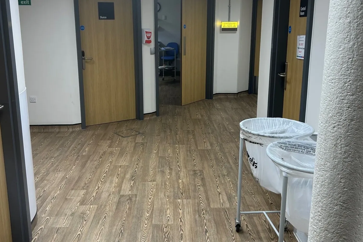 A department corridor with new doors, flooring and lighting at Wexham Park Hospital