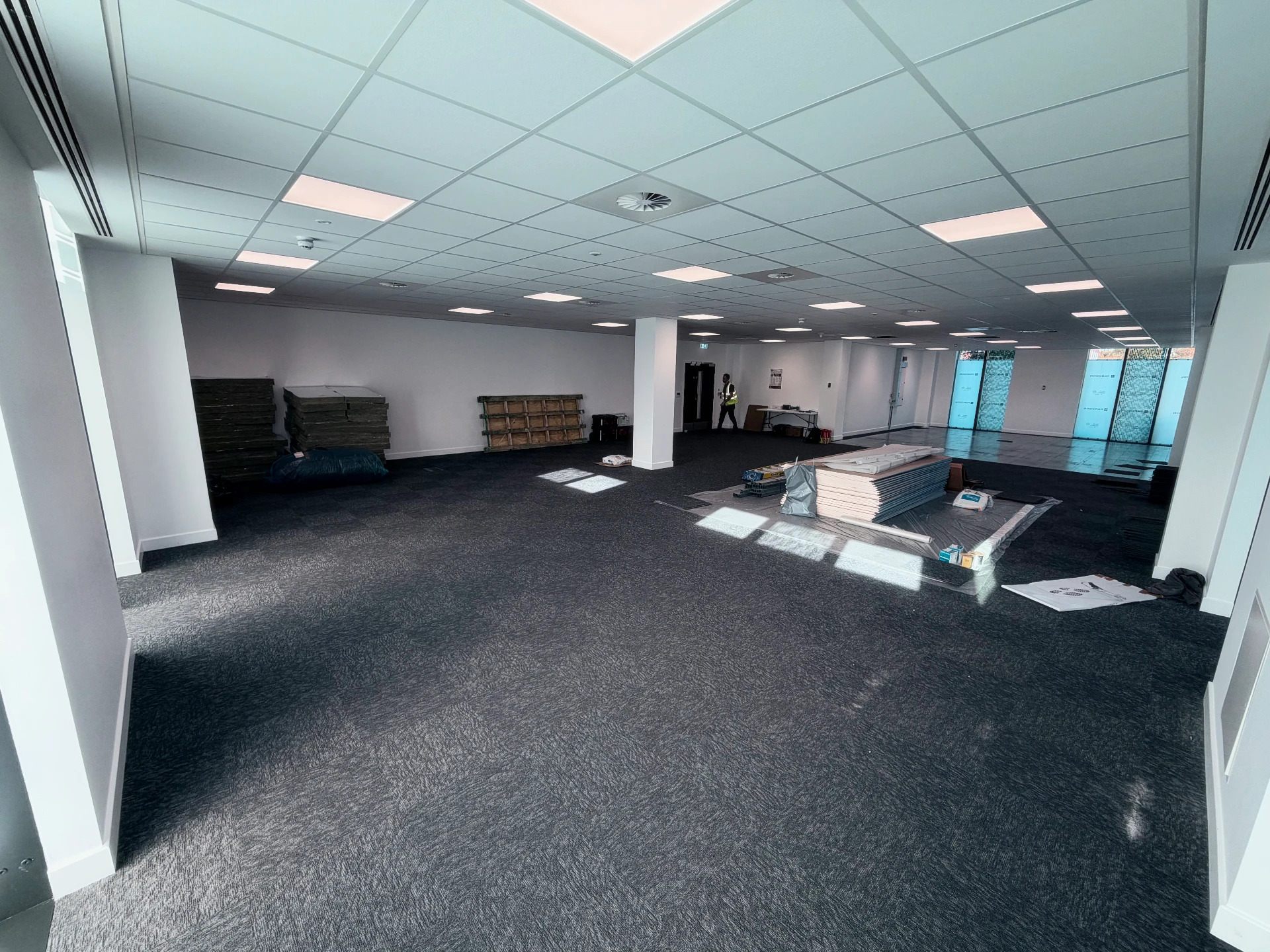 The open office floor being prepared for the new layout