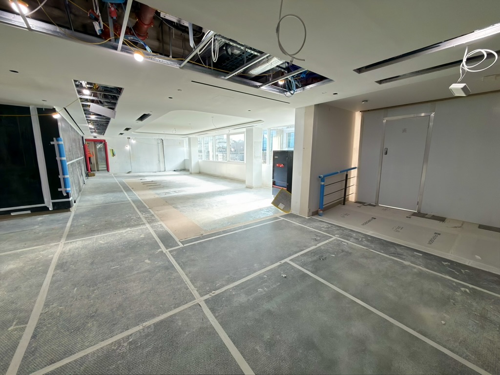 The main recovery floor at Wigmore Street with the ceiling grid open and the layout marked out below