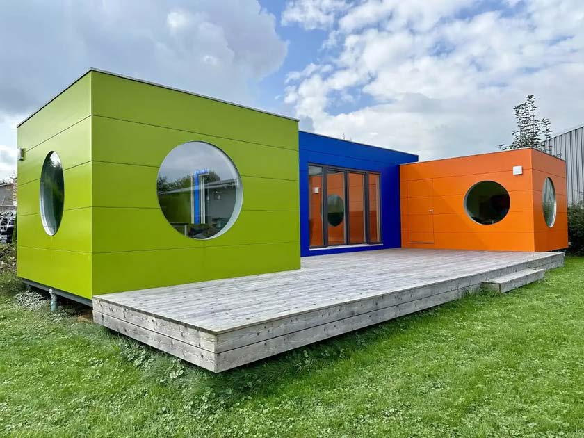 Colourful nursery pods with porthole glazing