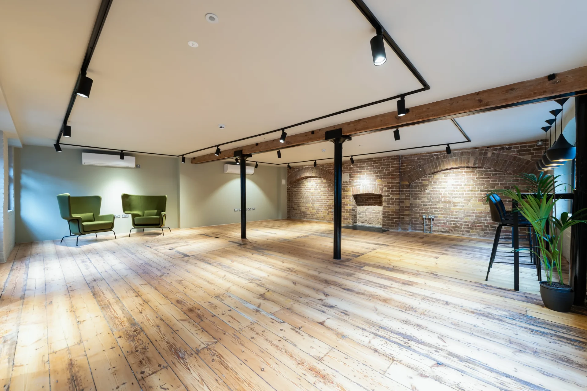 Restored roof timbers and open workspace at Endell Street