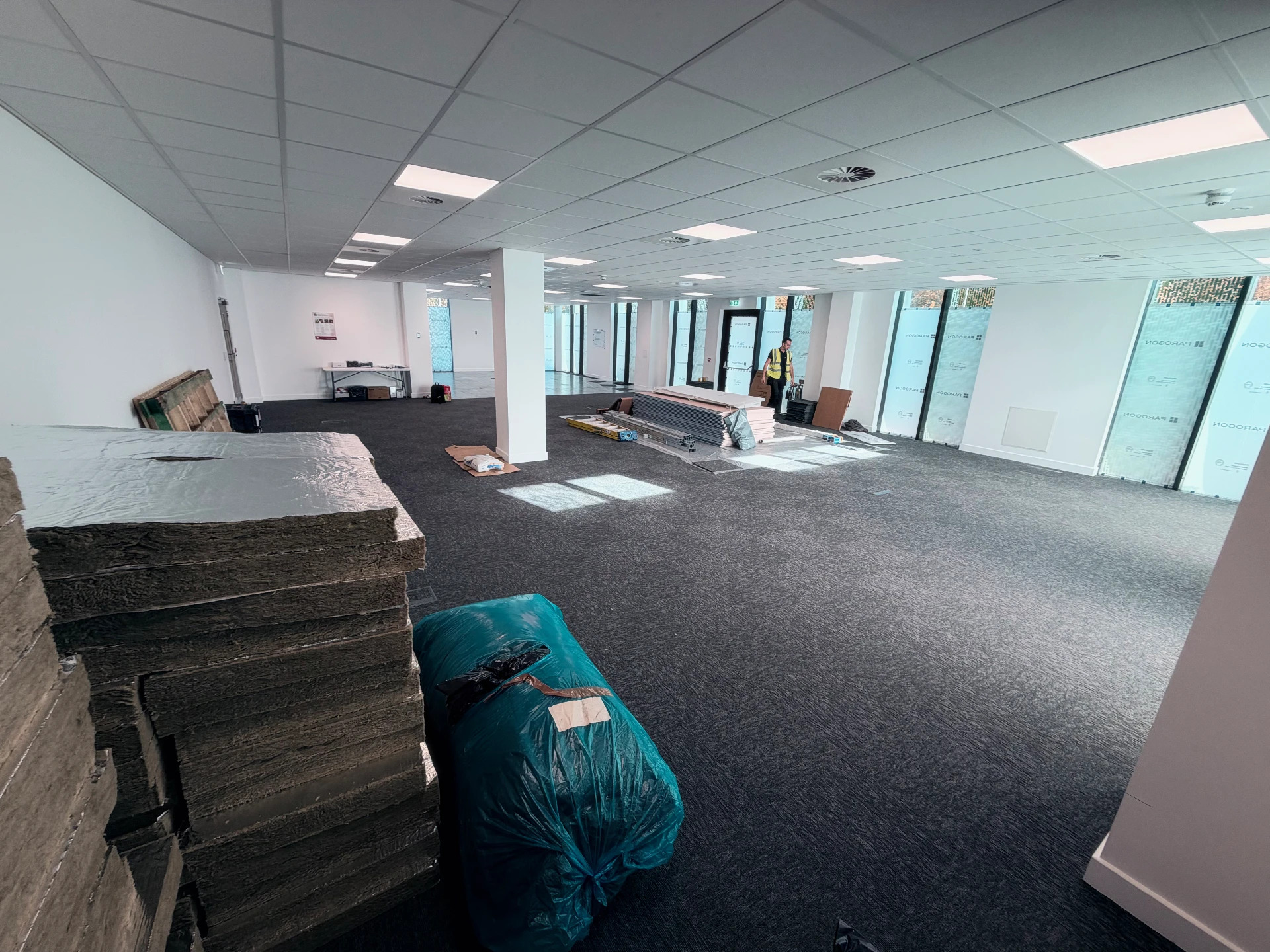 Inside the office floor with materials protected and stacked