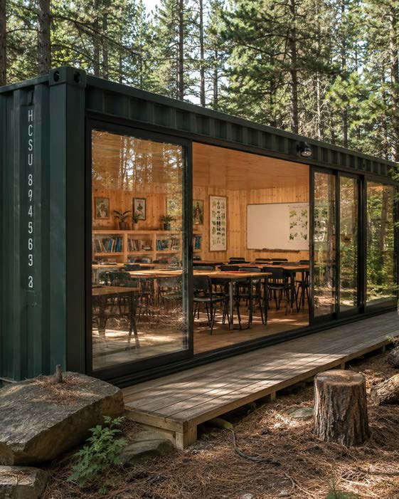 Timber-lined container classroom in a woodland setting